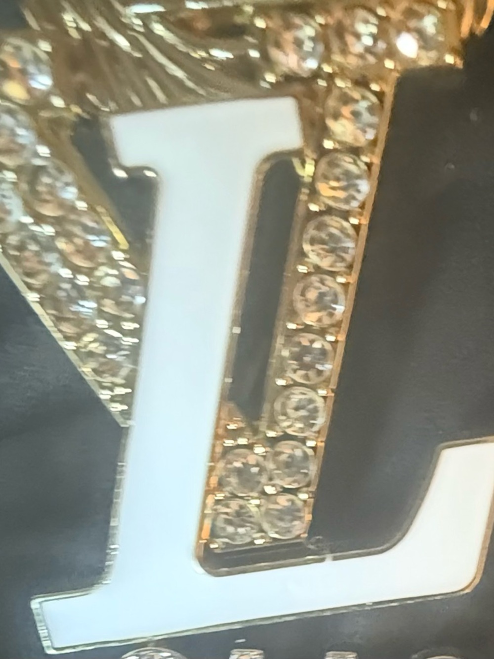 Louis Vuitton White and Gold Crystal LV Logo Accent brooch inspo